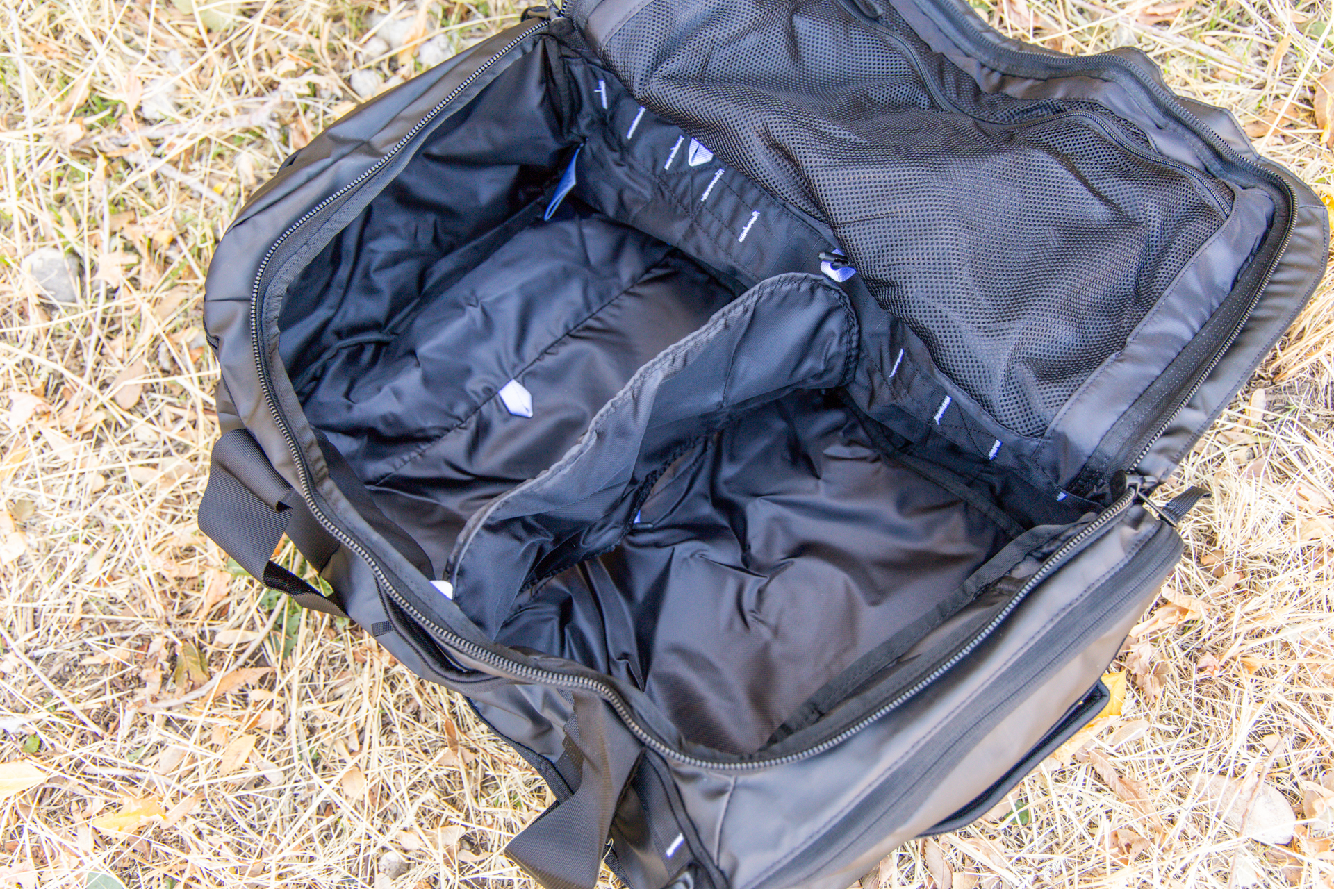 The inside of the duffel showing the interior divider positioned in the middle.