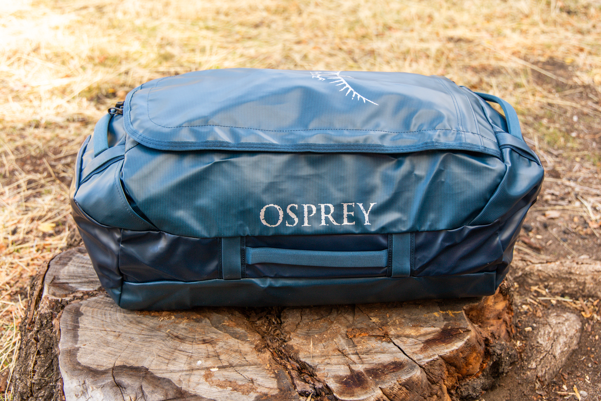 The durable exterior of the Osprey Transporter with sturdy grab handles on the side and ends.