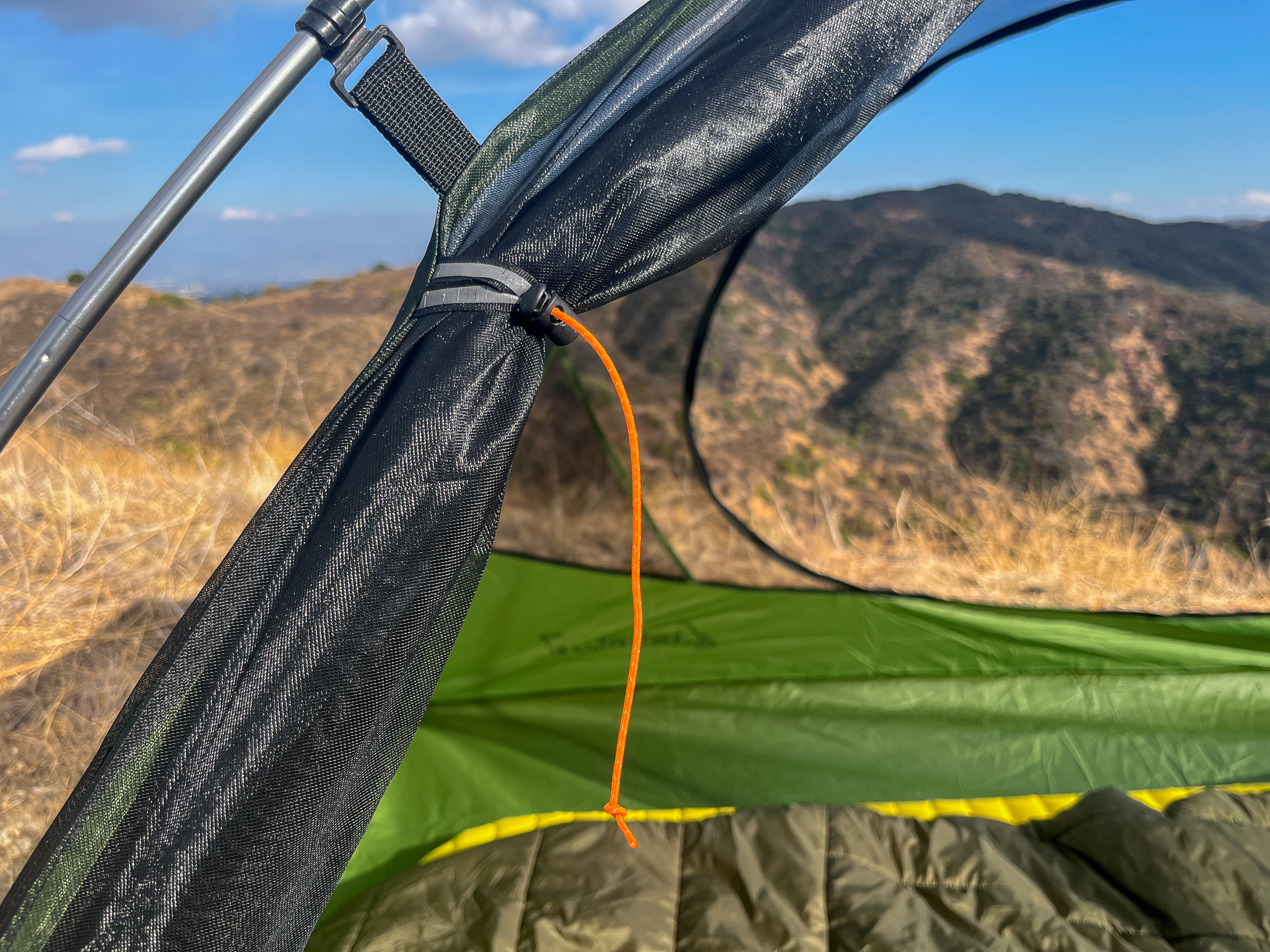 Closeup of the door ties on the Clostnature Polaris 2 with mountains in the background