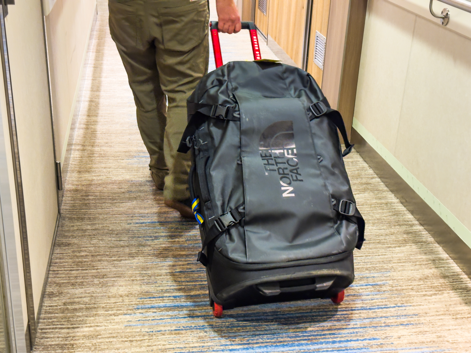 A man wheels the Rolling Thunder down a hallway.