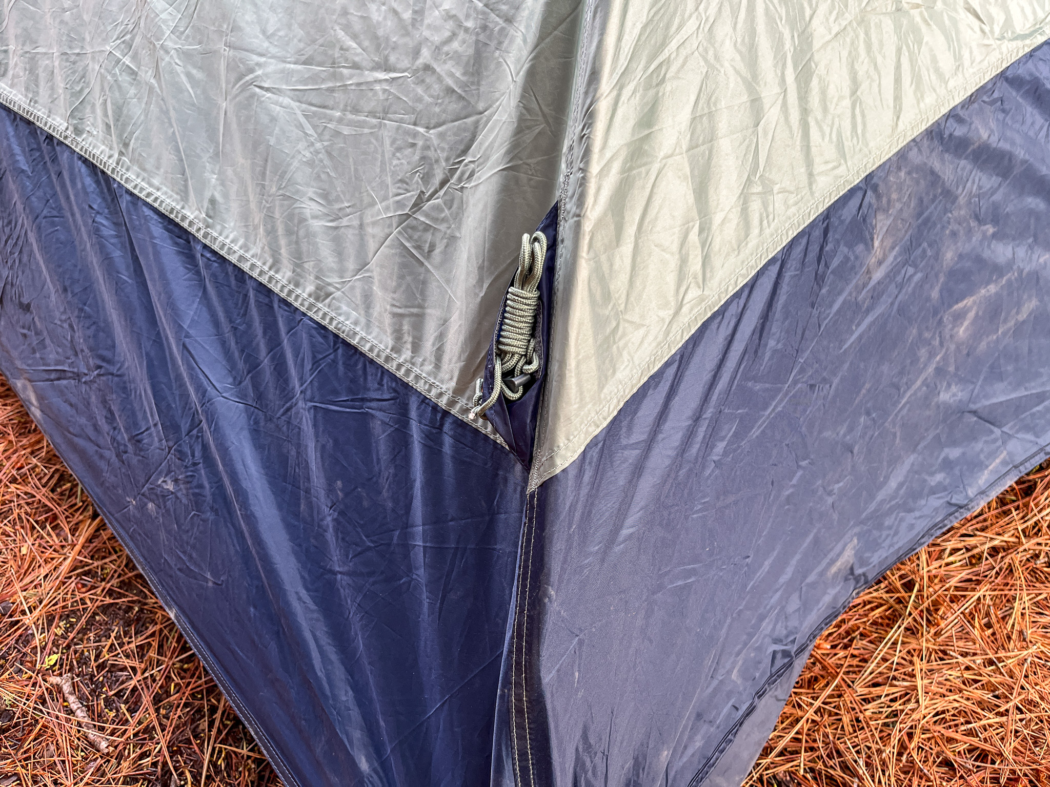 Closeup of the extra guy line attachment points and integrated stow pockets on the rainfly.