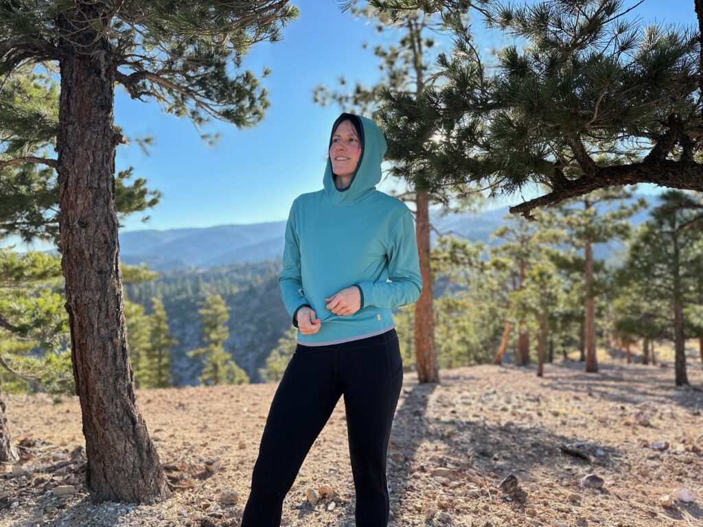 hiker walking around pine forest