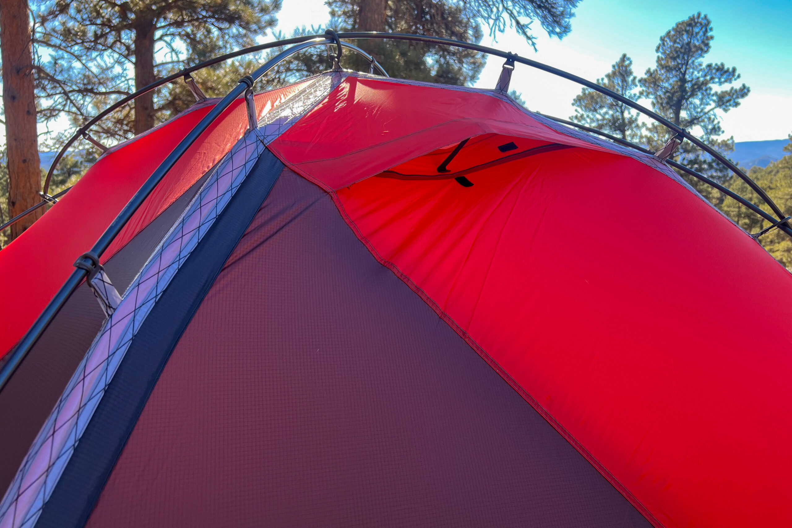 Close-up of a ventilation panel integrated into the rainfly of the tent, providing airflow while maintaining protection.