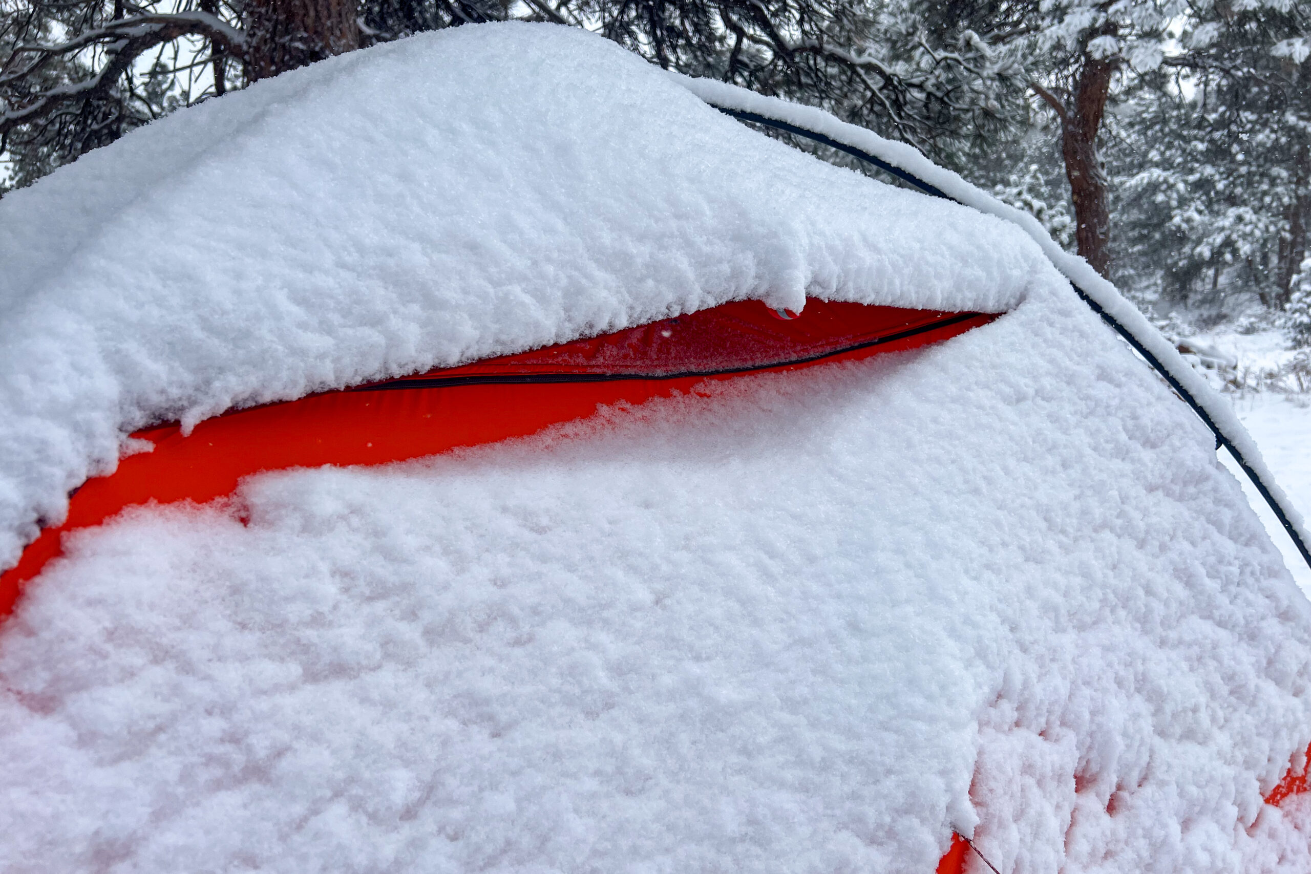 Close-up of a snow-covered vent on the MSR Advance Pro 2 tent, designed for airflow and reduced condensation in winter conditions.