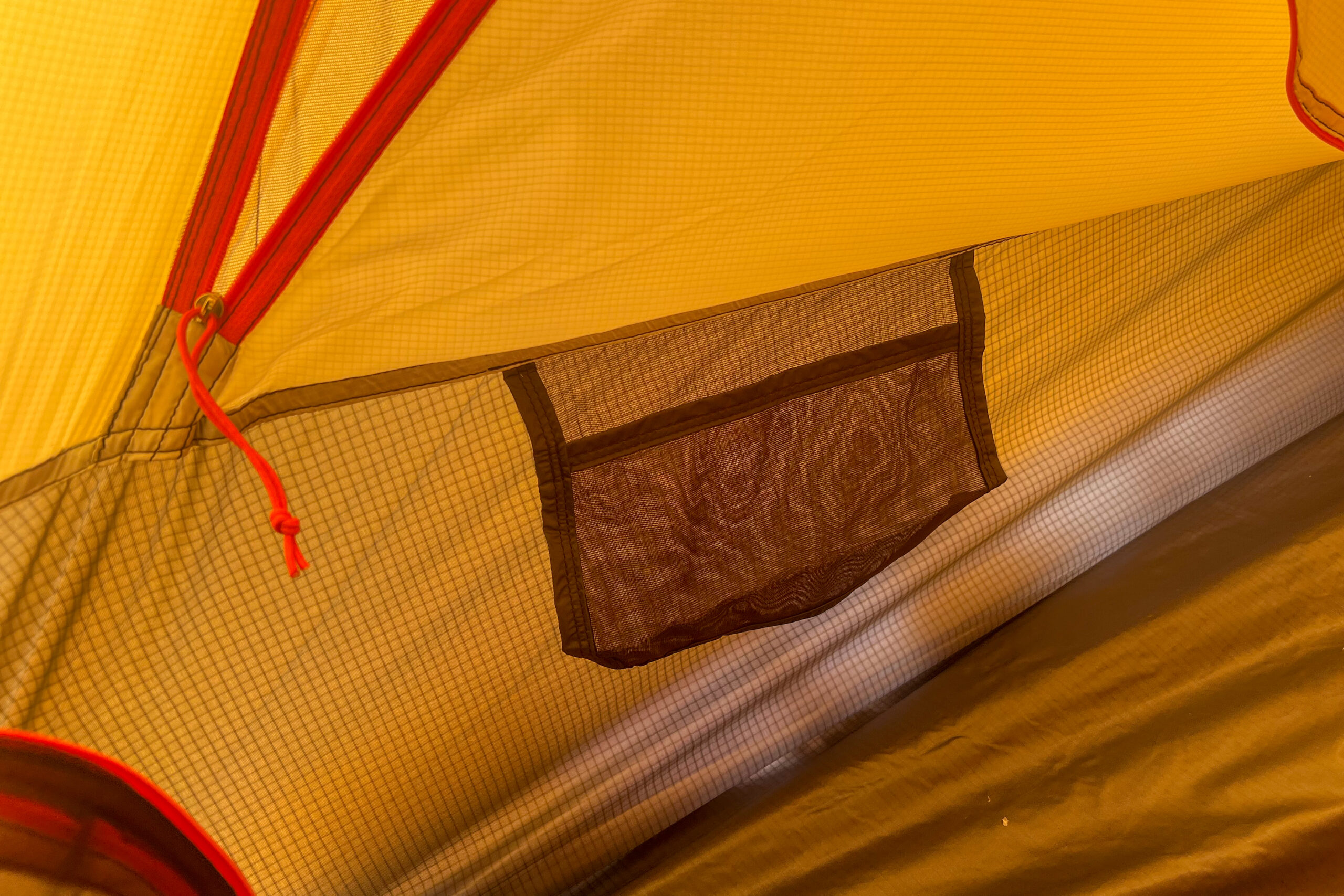 Close-up of a mesh storage pocket inside the Nemo Kunai 2 tent.