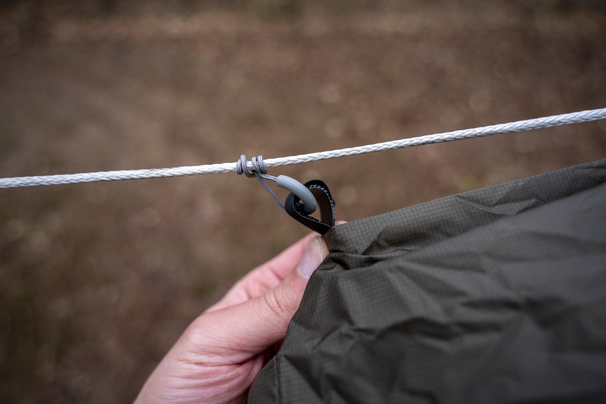 a prussik knot loop attaches to a bag on a hammock ridgeline