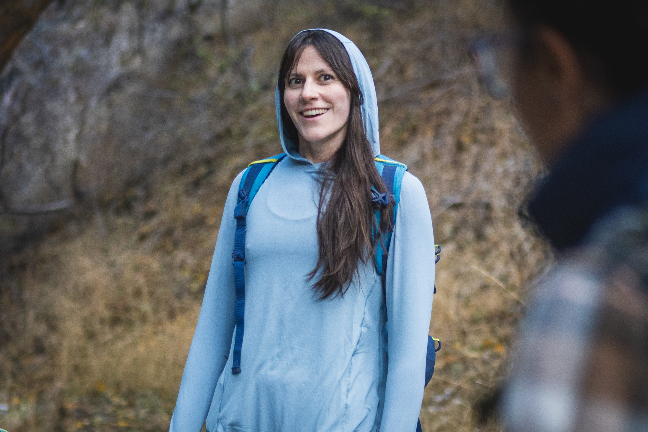 Hiker smiling at friend