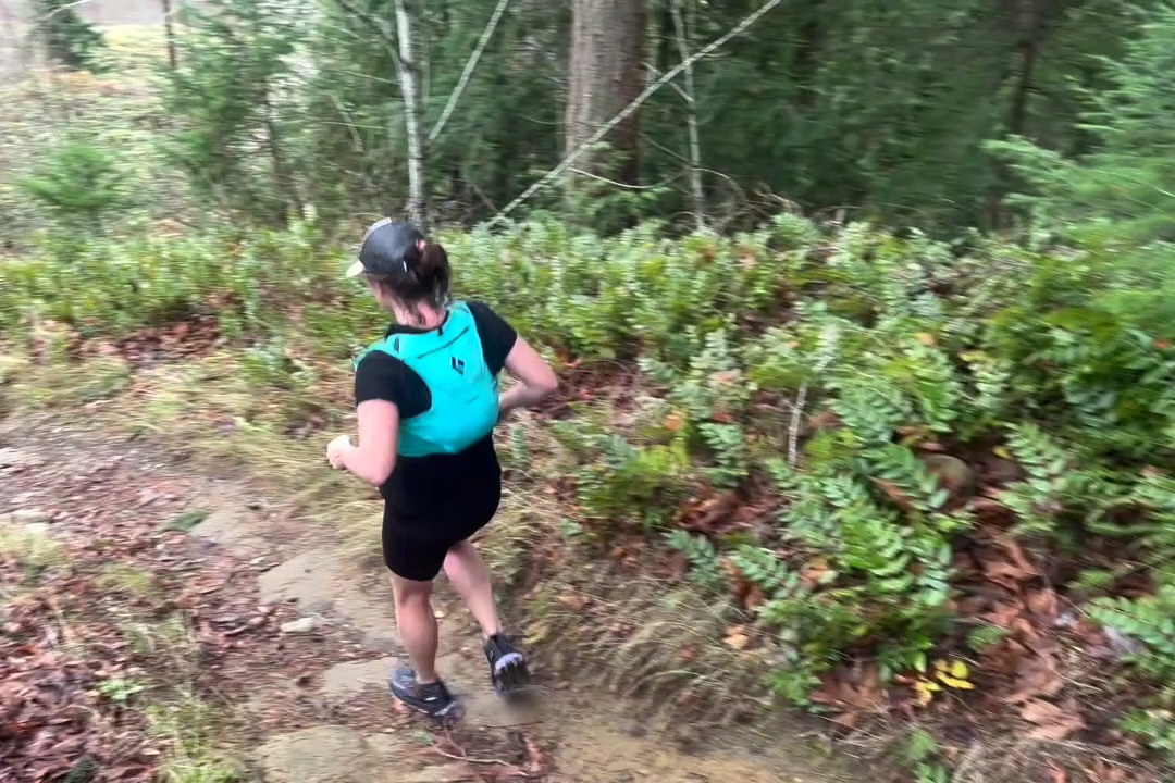 Runner wearing a Black Diamond Women's Distance 4 Hydration Vest