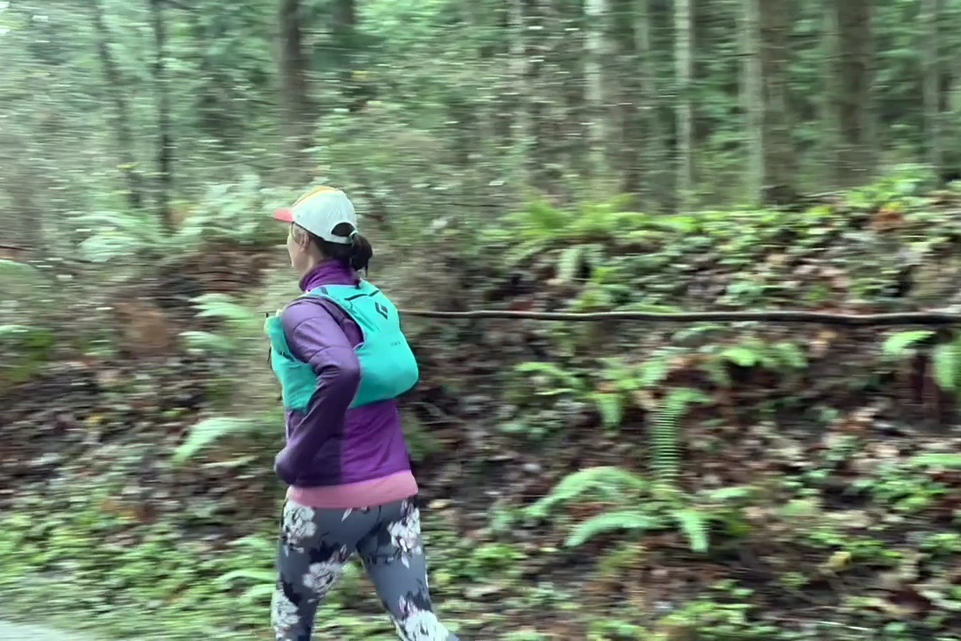 Runner wearing a Black Diamond Women's Distance 4 Hydration Vest