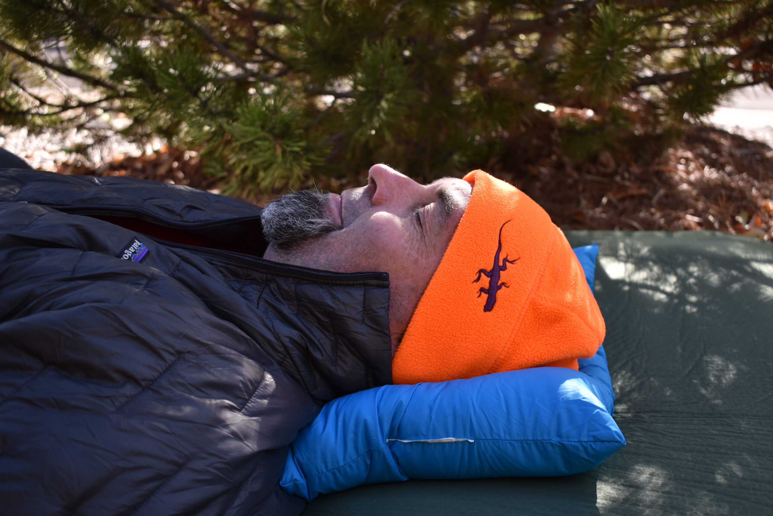 The author's head resting comfortably on top of the Western Mountaineering Cloudrest Down pillow