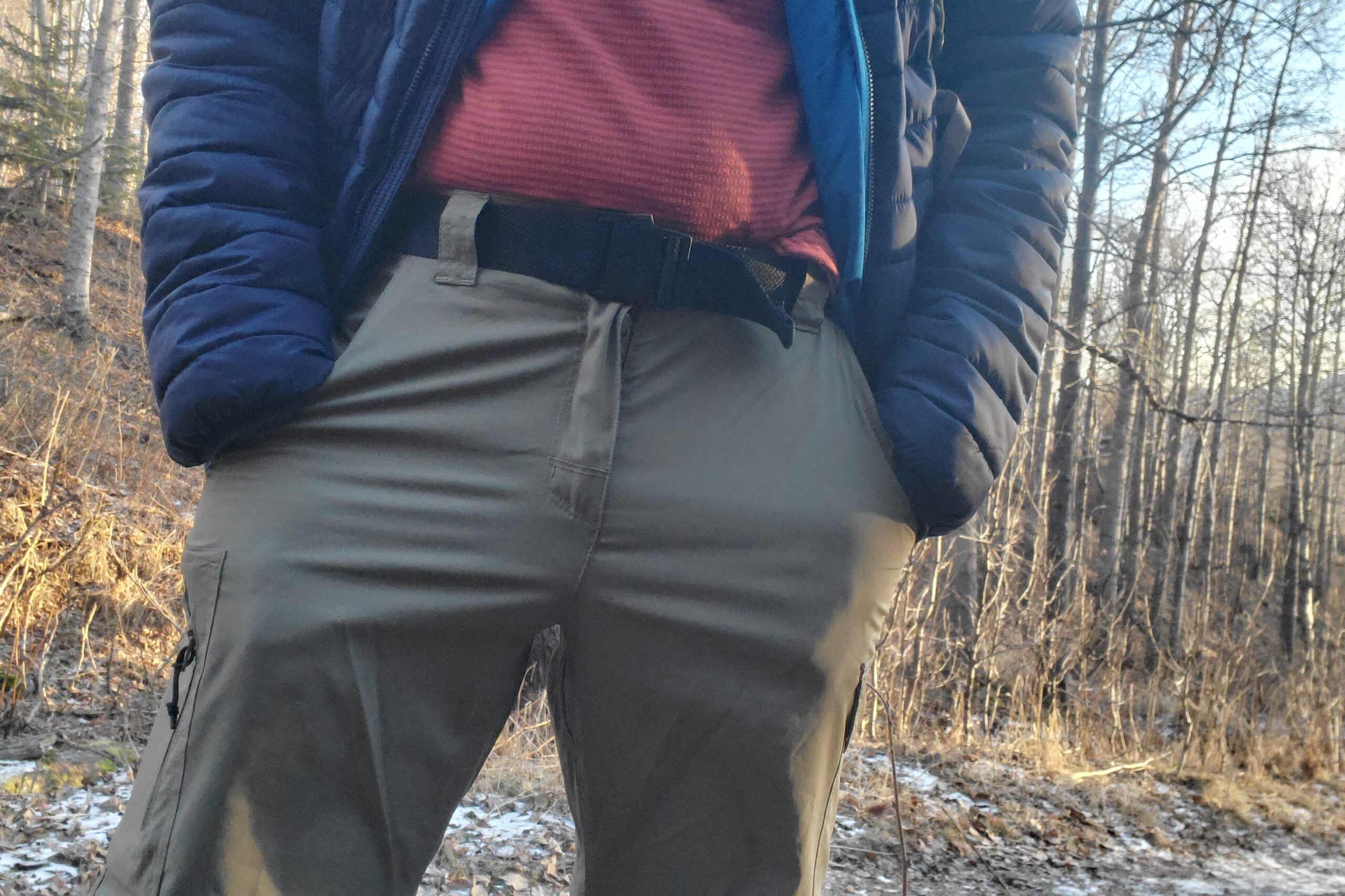 A closeup of the belt on a pair of hiking pants.