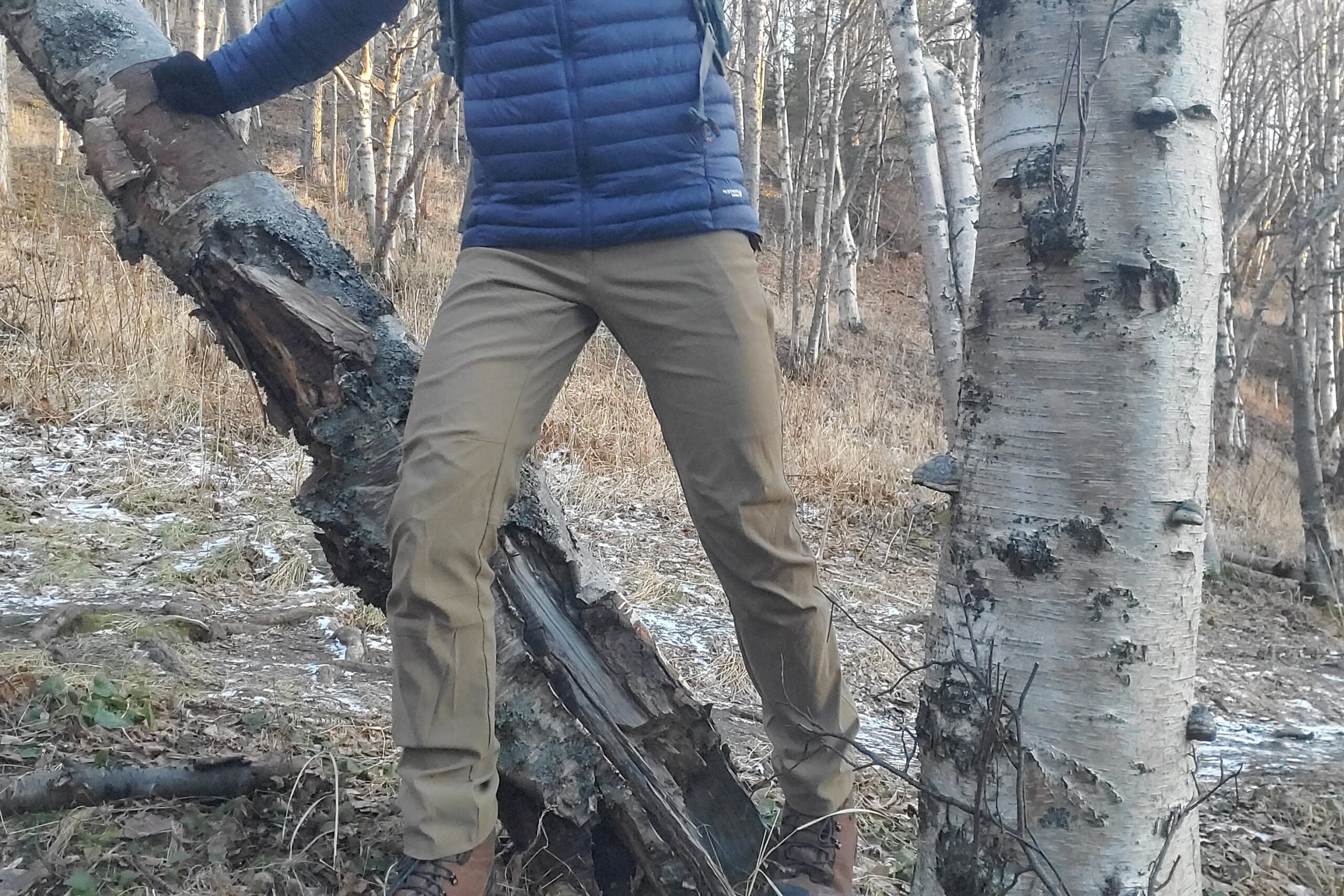 A closeup of pants worn while hiking off trail.