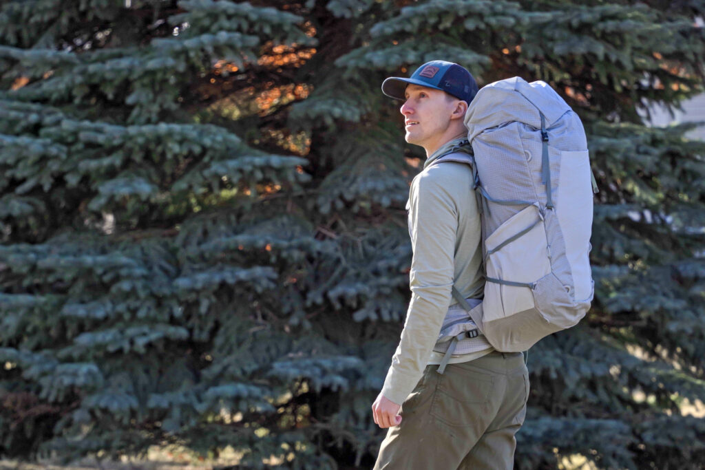 a man wearing a white backpack