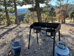 the Camp Chef EX60LW Explorer 2 Burner Outdoor Camping Modular Cooking Stove in a gorgeous, rocky high desert camp ground