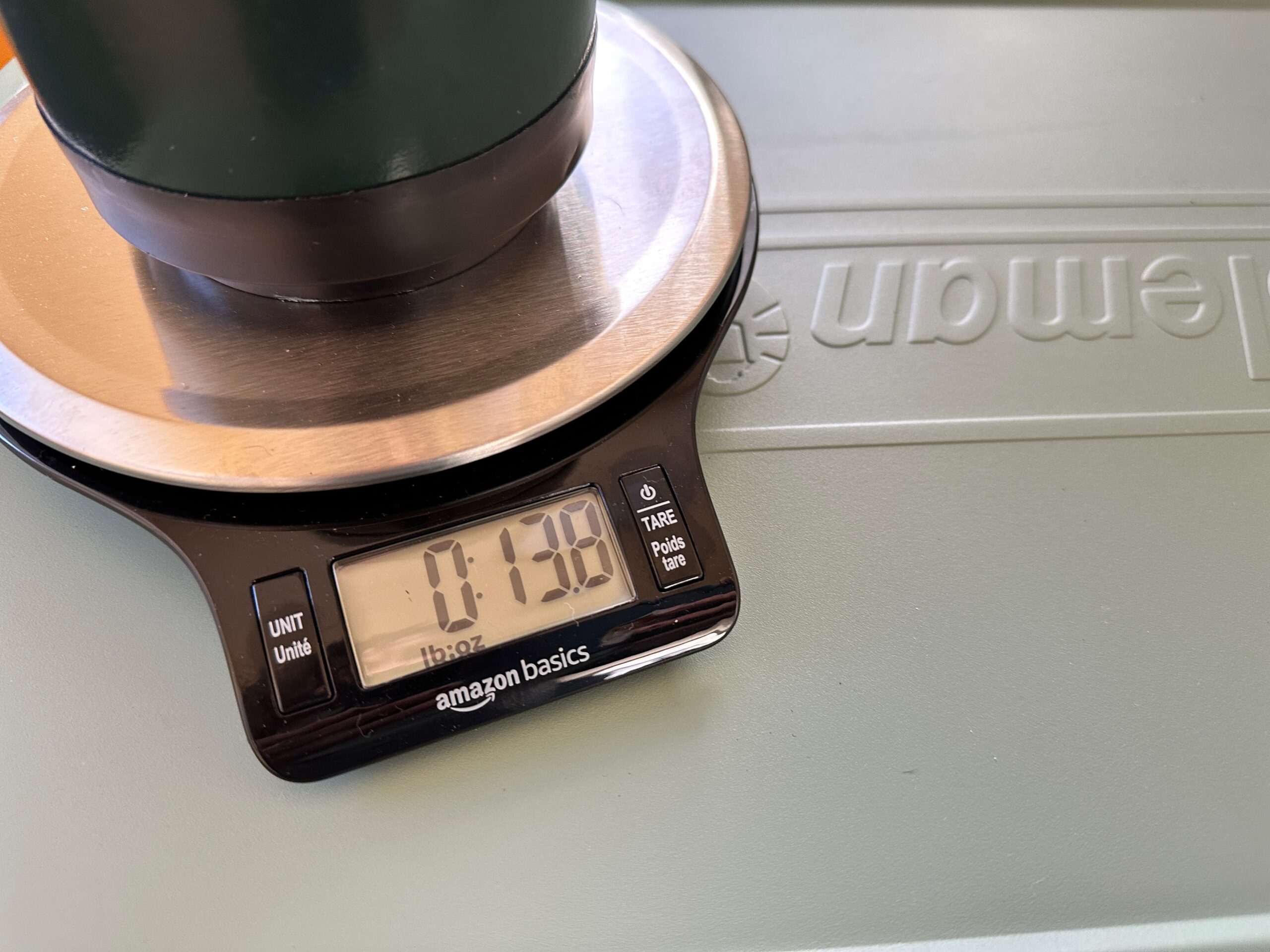 A close up of a scale weighing fuel for a stove to show efficiency