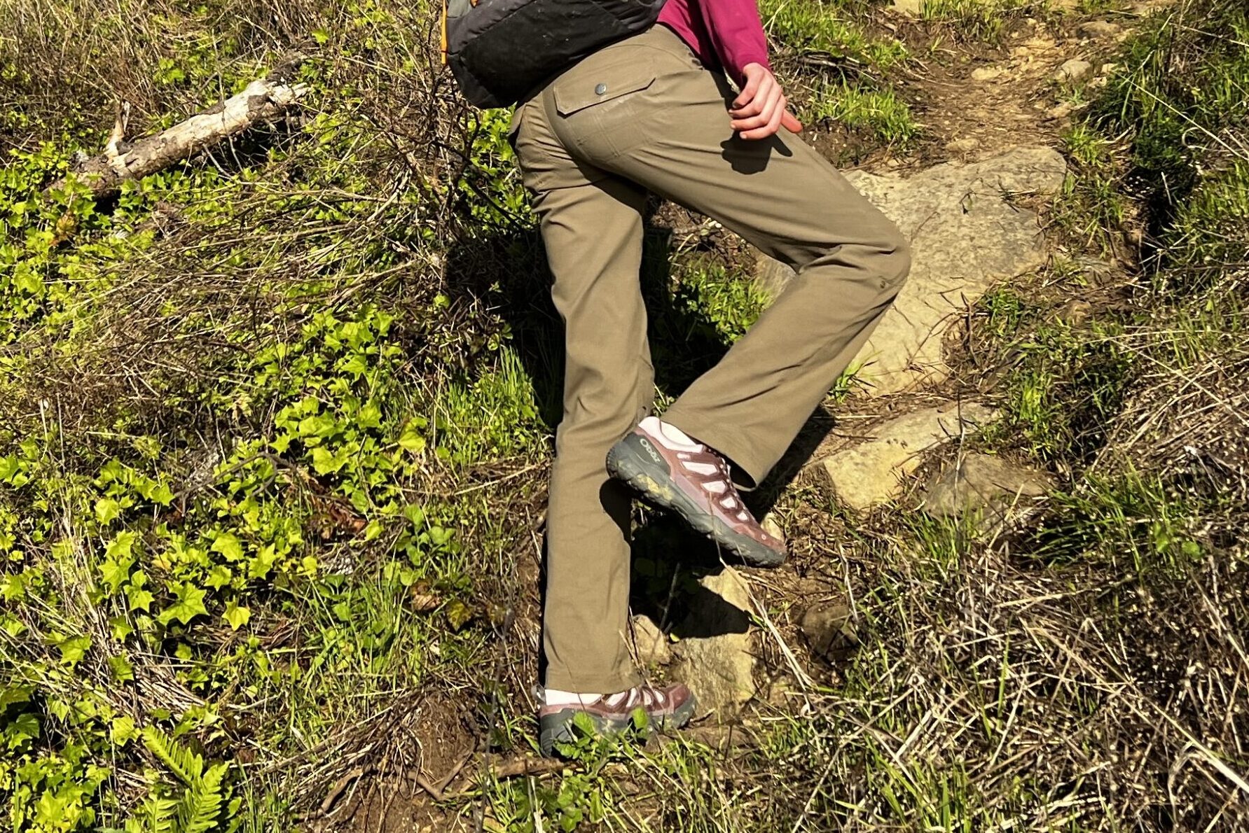 Women hiking up a steep trail in Oboz hiking shoes.