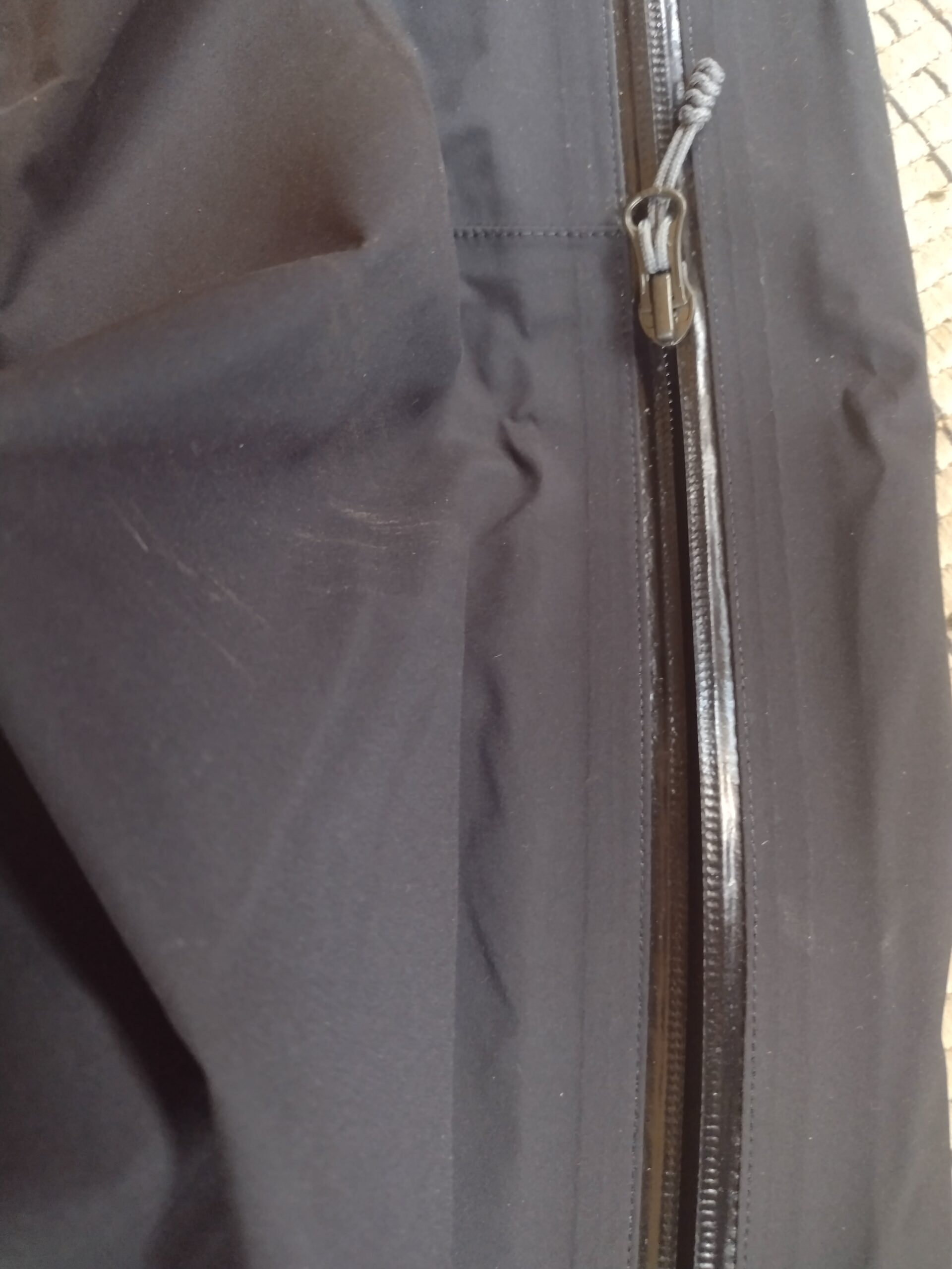 Closeup of a side zipper on the Outdoor Research Foray pants