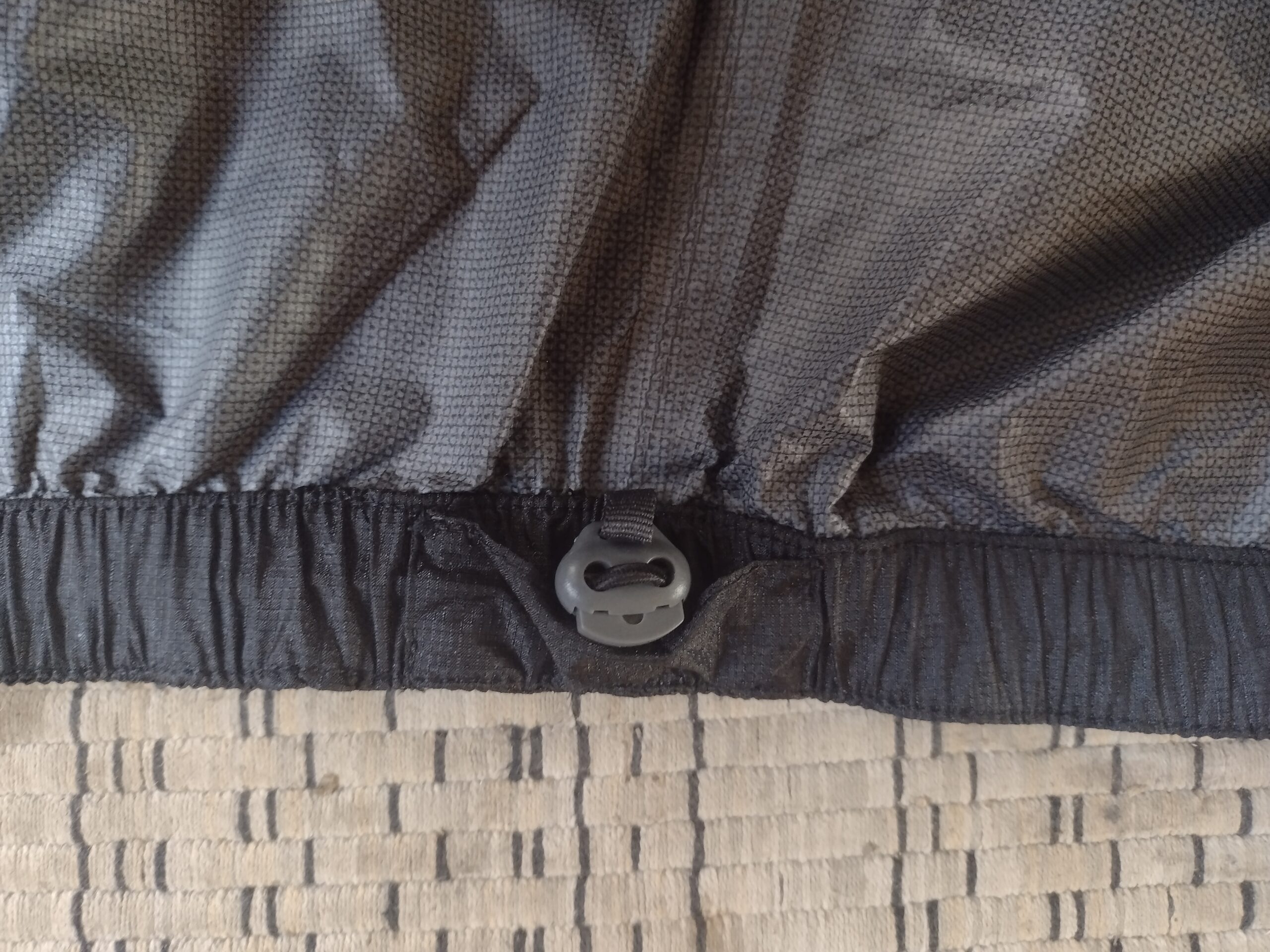 Closeup of the interior waistband on the Outdoor Research Helium rain pants.