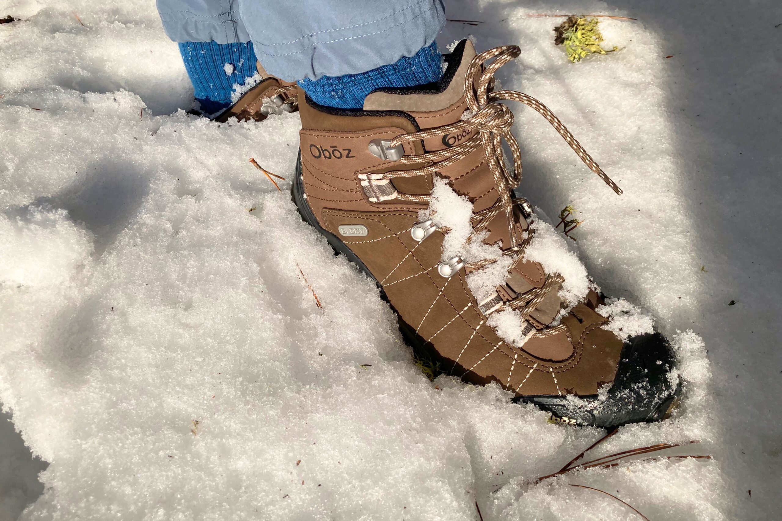 Hiker wearing the Women’s Oboz Bridger WP hiking boots in snow