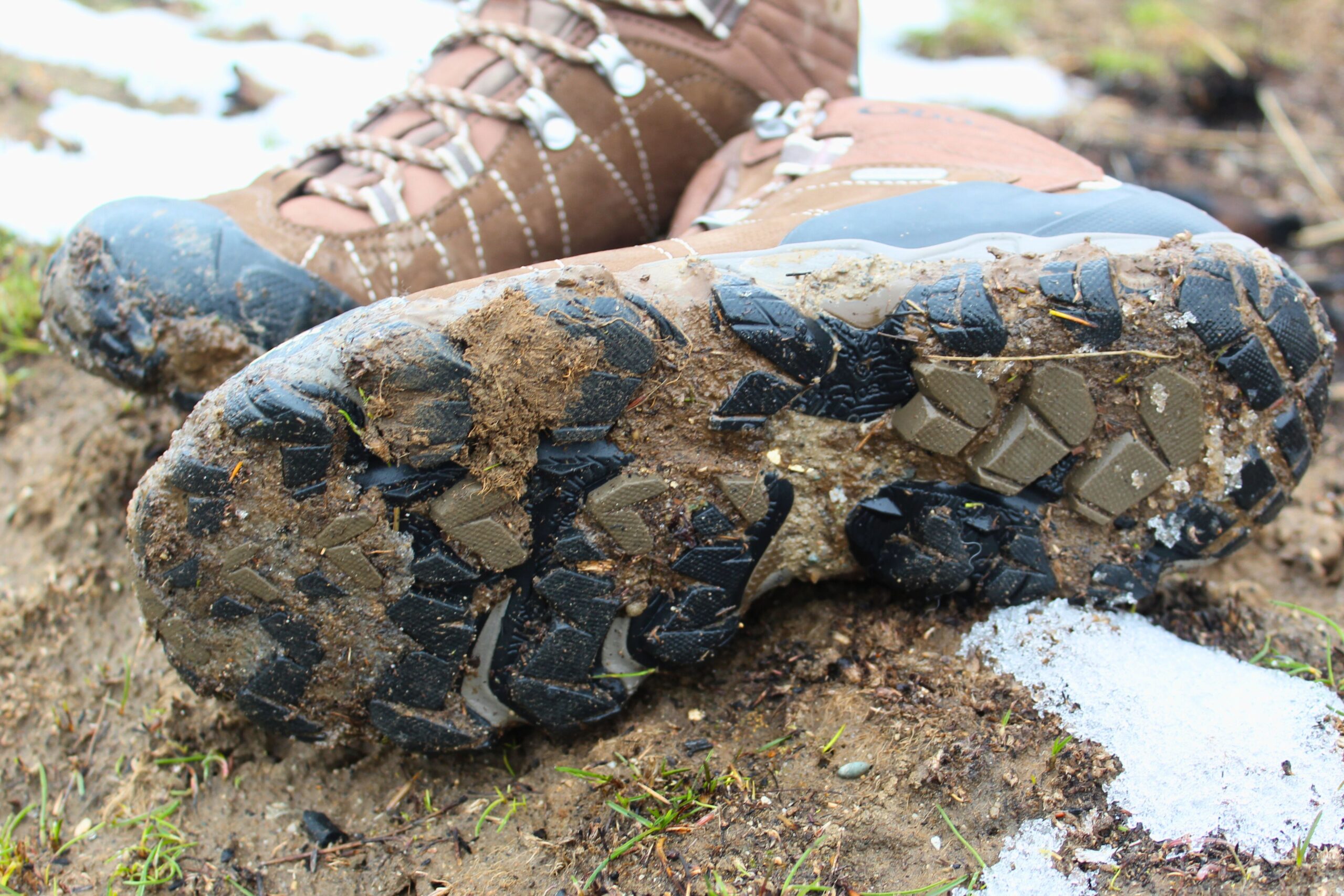 The sole of the Women’s Oboz Bridger WP hiking boots after hiking in mud