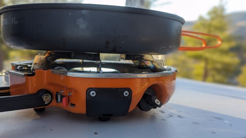 close up shots of the self-igniting system of the Jetboil Genesis Basecamp System