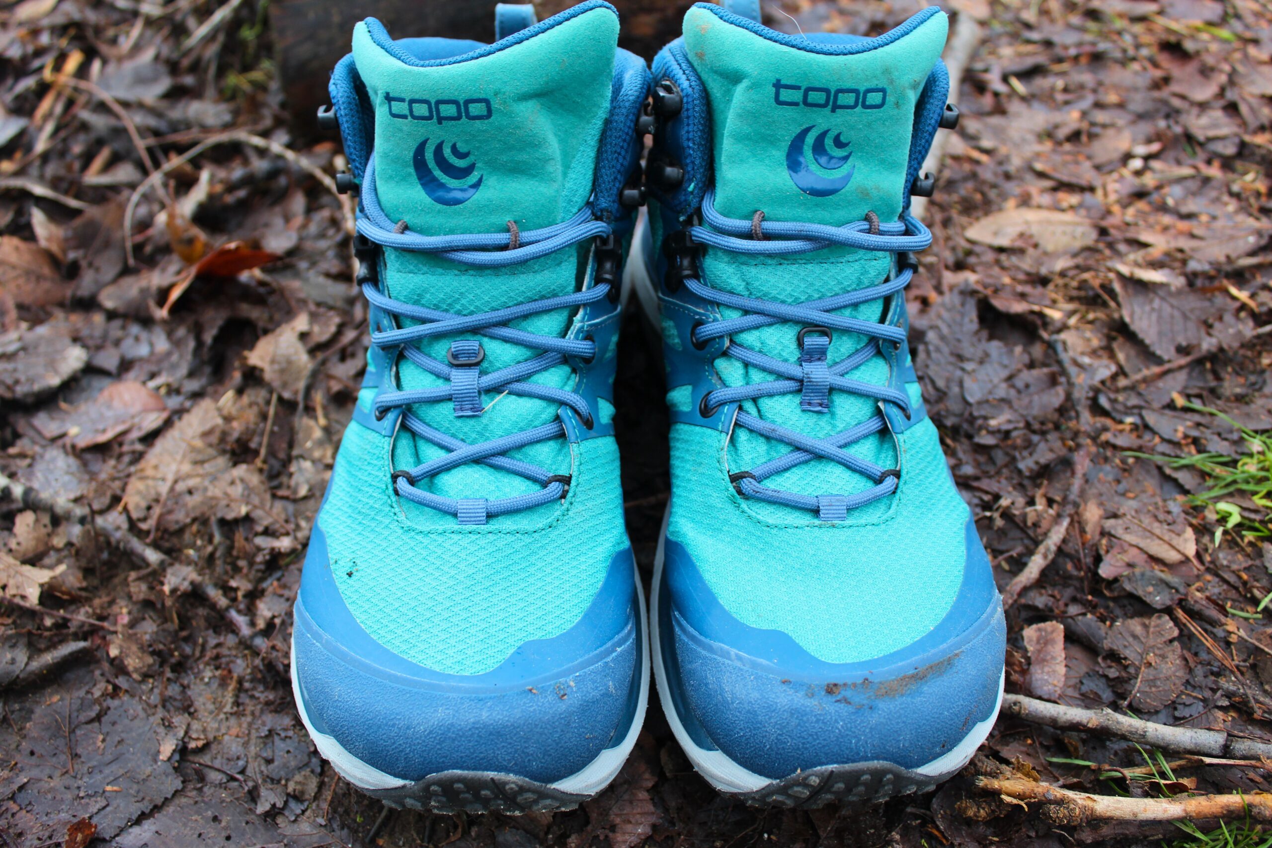 The Women’s Topo Trailventure 2 WP boots sitting on the ground outside