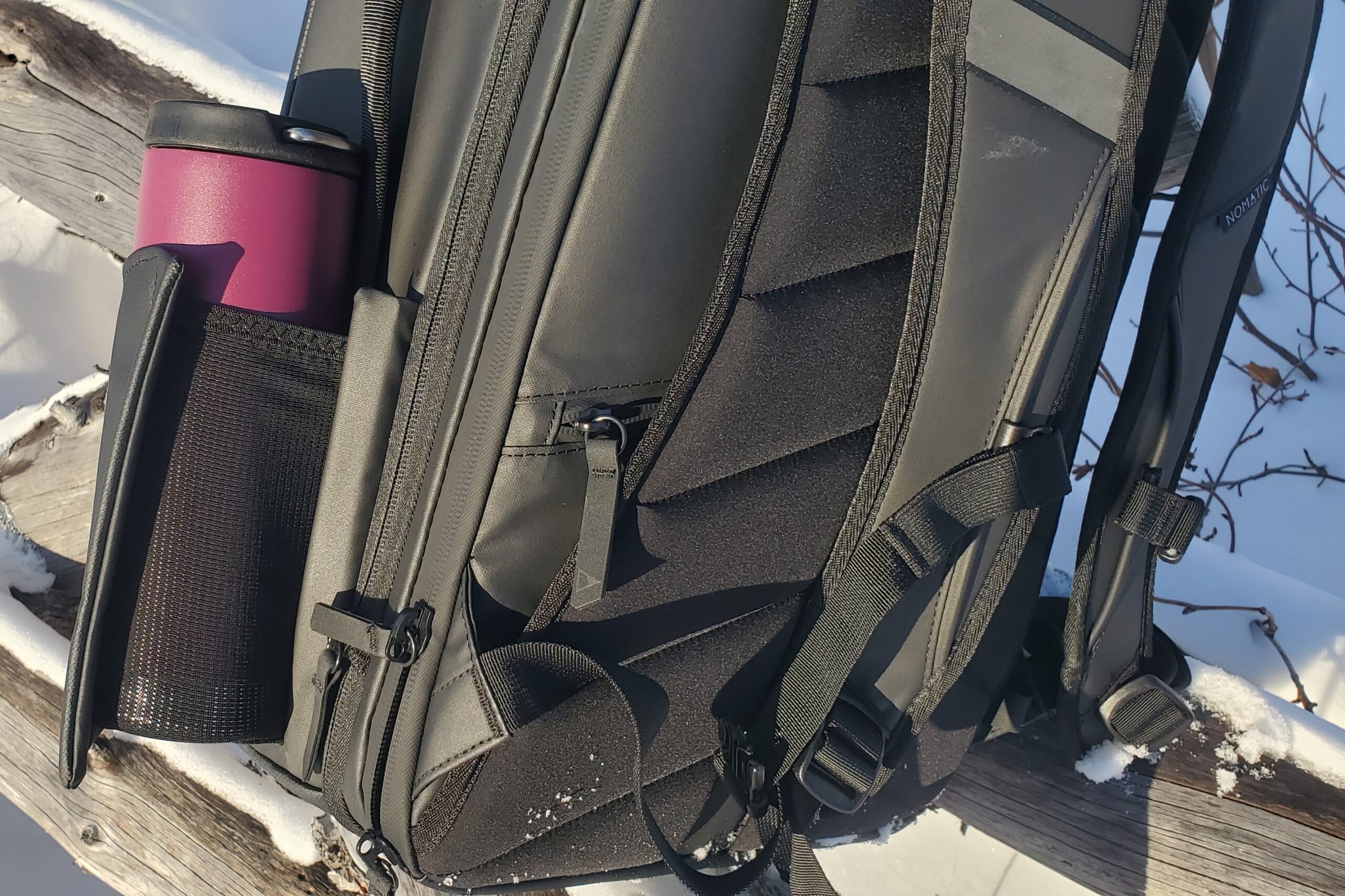 A closeup of the water bottle pouch of a backpack