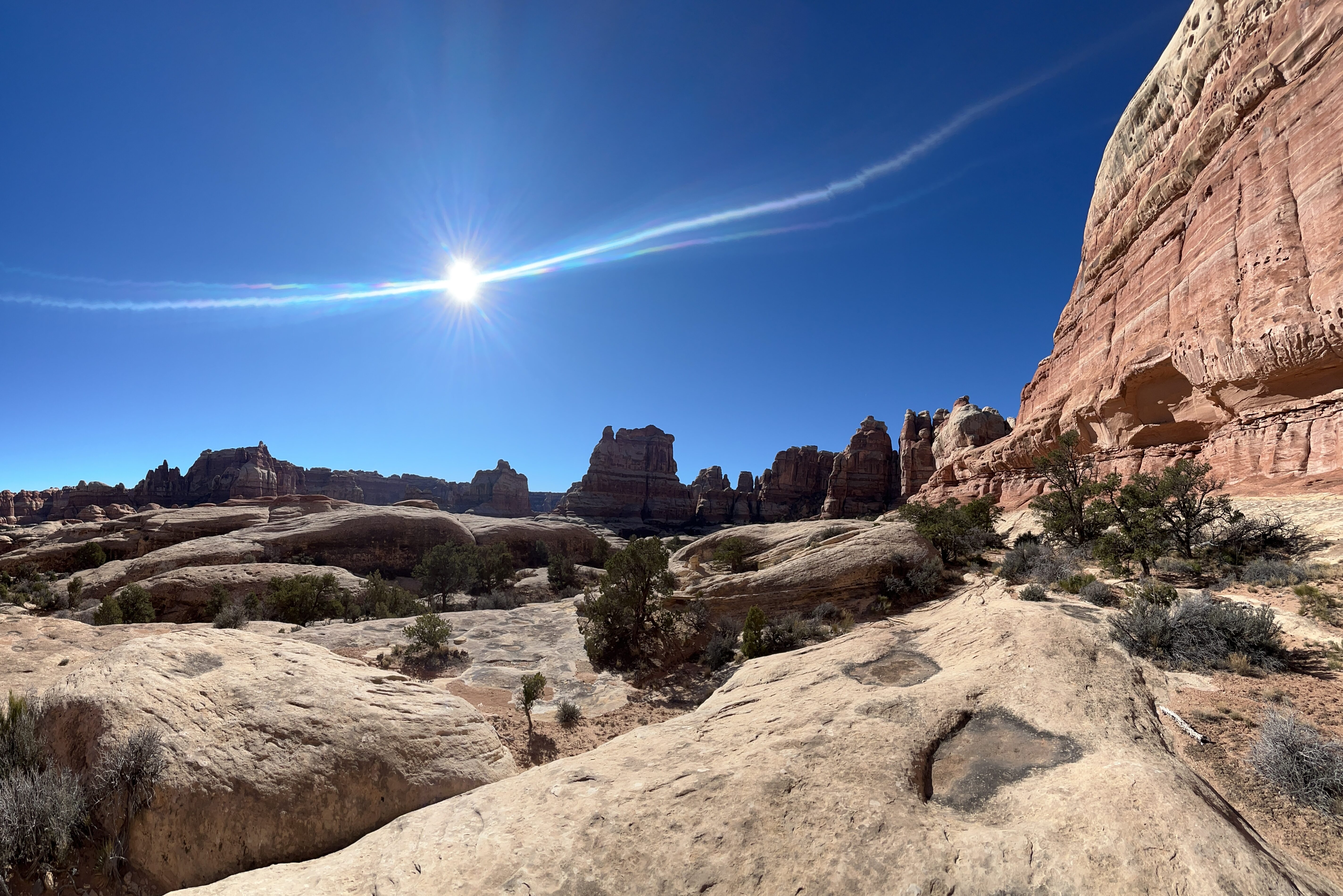 Cloudless blue sky with deep red rock canyons in Canyonlands National Park